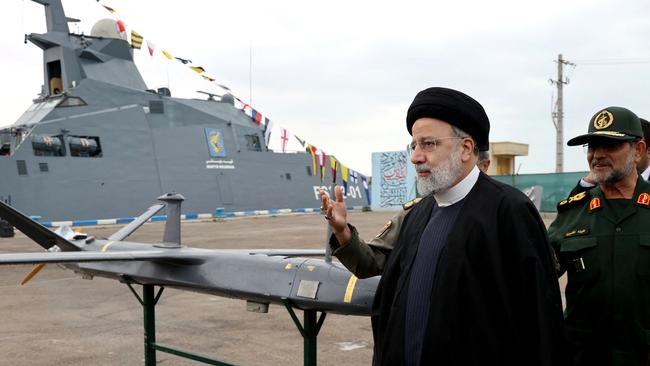 Iranian President Ebrahim Raisi (C) visits the Iranian revolutionary guards corps (IRGC) navy base in Bandar Abbas, southern Iran. Picture: Iranian Presidency / AFP