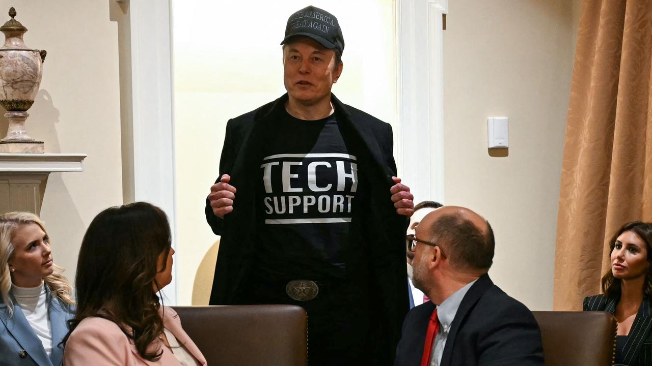 Elon Musk wore his infamous ‘Tech Support’ t-shirt during the first cabinet meeting. Picture: Jim Watson/AFP