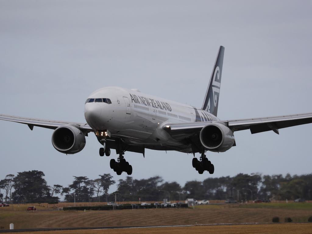 Air New Zealand flight NZ1942 touches down at Auckland International Airport after departing from Wuhan, China. Picture: Dean Purcell-Pool/Getty Images.