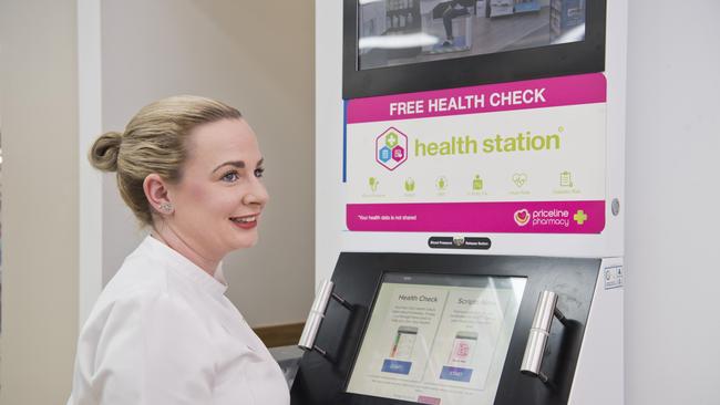 Priceline Pharmacy Westridge pharmacist Kimberley Stephens with the Health Station kiosk.