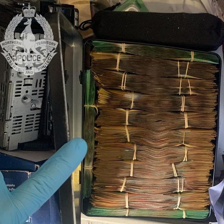 A man is facing multiple drug charges after police allegedly found cash and drugs in his home. Picture: NT Police.