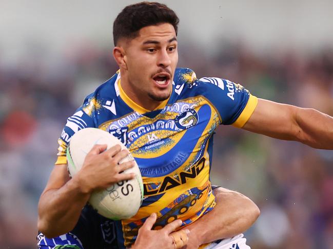 CANBERRA, AUSTRALIA - MAY 29: Dylan Brown of the Eels is tackled during the round 12 NRL match between the Canberra Raiders and the Parramatta Eels at GIO Stadium, on May 29, 2022, in Canberra, Australia. (Photo by Mark Nolan/Getty Images)