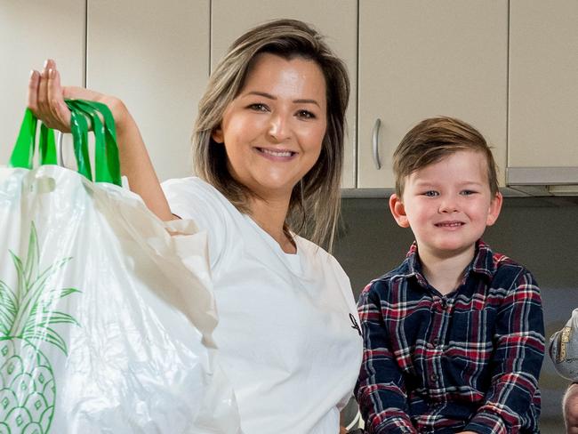 Jenna Earle, 35 and husband Trav Earle, 37, and children Ashton, 4, and Hugh , 17 months are preparing to snap up Christmas bargains at the upcoming Cyber weekend in late November. Picture: Jake Nowakowski