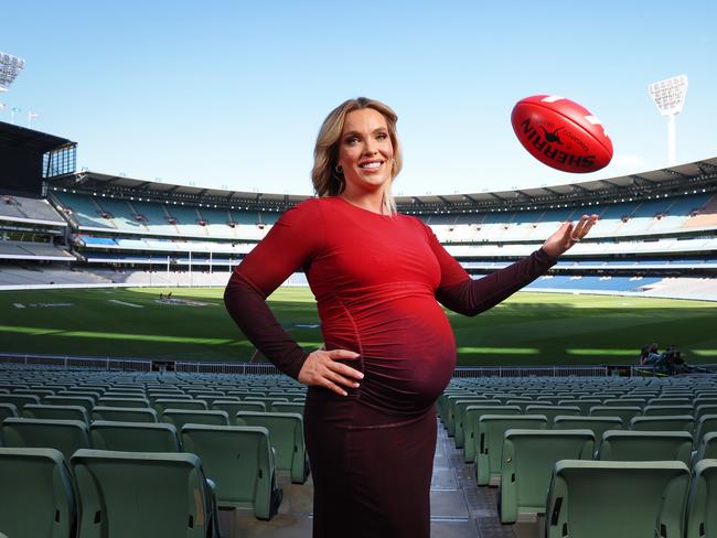 Channel 7 AFL commentator Abbey Holmes is preparing to go on maternity leave. Abbey with baby bump at the MCG.                                                              Picture: David Caird