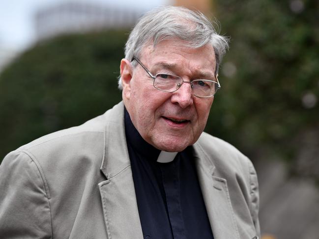 Cardinal George Pell is seen outside St Mary's Cathedral in Sydney, Friday, December 15, 2017. Rev. Anthony Fisher is set to make a statement following the release of the final report into the Royal Commission into Institutional Responses to Child Sexual Abuse. (AAP Image/Joel Carrett) NO ARCHIVING