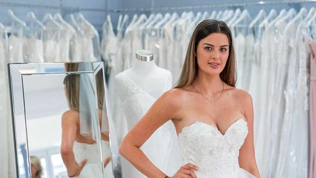 Cheryl shops for her wedding dress in a scene from the TV series Married At First Sight. Picture: MARC GRIMWADE