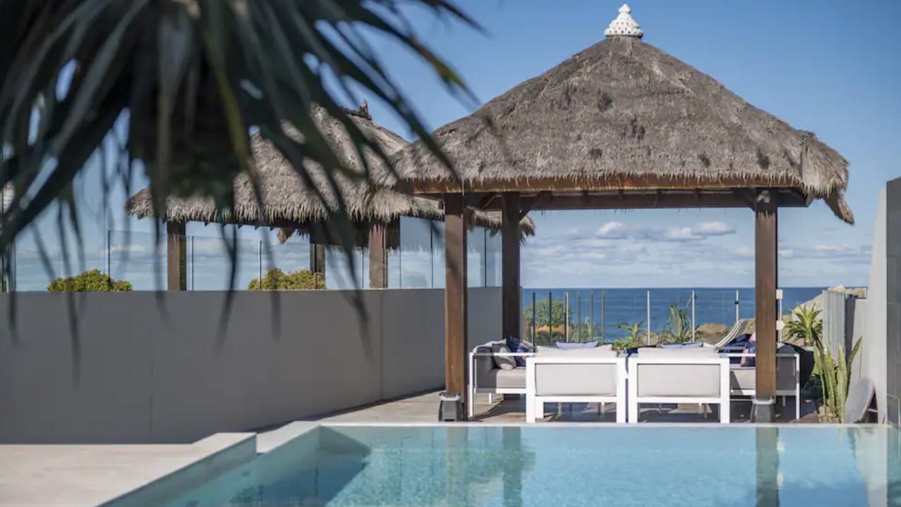 Sit under the gazebo with a glass of chardonnay while the kids go for a swim at this Sapphire Beach luxury beach house.