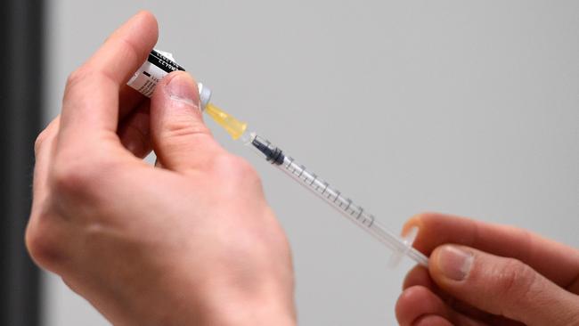 A health worker prepares a dose of the Pfizer-BioNTech COVID-19 vaccine in Nancy, eastern France, on Wednesday. Picture: AFP