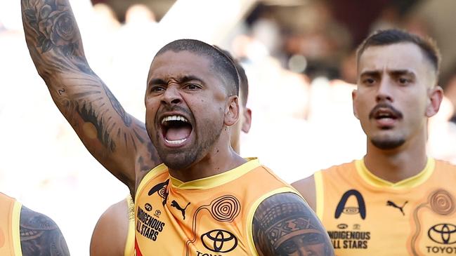 PERTH, AUSTRALIA - FEBRUARY 15: Bradley Hill of the All Stars leads the war cry during the 2025 Toyota AFL Indigenous All Stars match between the Indigenous All Stars and the Fremantle Dockers at Optus Stadium on February 15, 2025 in Perth, Australia. (Photo by Michael Willson/AFL Photos via Getty Images)