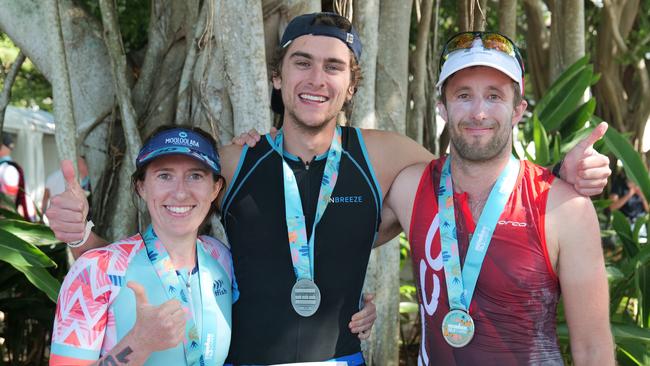 Cairns locals Jennifer Evans and Andrew Klink with WA competitor Chris Williamson completed this year's Cairns Ironman 70.3 triathlon. Picture: Georgia Clelland