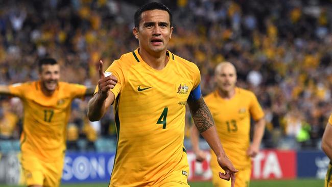 Tim Cahill celebrates a goal against Syria.