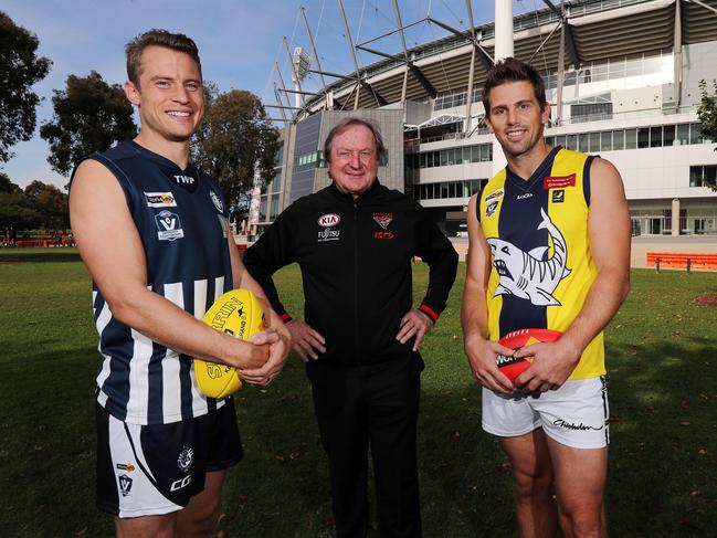 Kevin Sheedy with Jason Davenport (left) of the Geelong Netball football league and Rikki Johnston (right) of the Mornington Peninsula Nepean football league who will play in the curtain raiser to the round 8 Country Game between Essendon and geelong at the MCG. Pic: Michael Klein