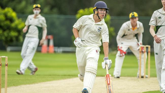 Cooper Mackie scores a run. (AAP Image/Richard Walker)