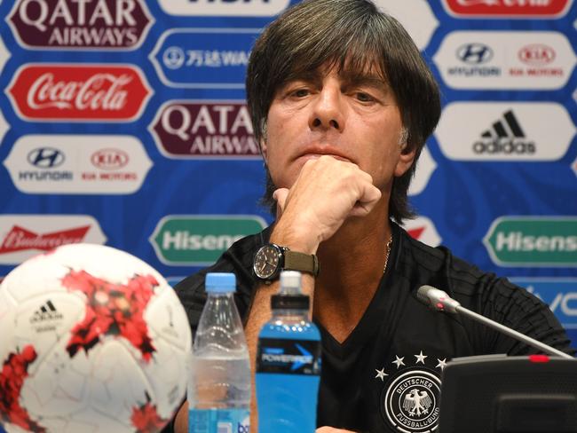 Germany's coach Joachim Loew gives a press conference during the Russia 2017 Confederation Cup football tournament in Sochi on June 18, 2017. / AFP PHOTO / PATRIK STOLLARZ