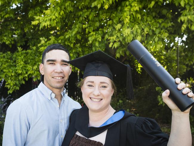 Frank Tone congratulates Heidi Tone on her Bachelor of Science degree at a UniSQ graduation ceremony at Empire Theatres, Tuesday, October 31, 2023. Picture: Kevin Farmer