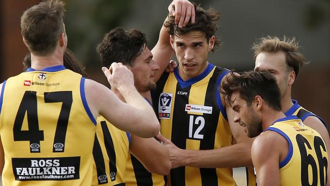 Sandringham players celebrate a Max King goal last season.