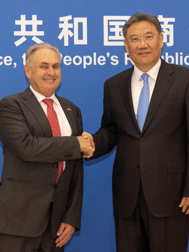 Trade Minister Don Farrell shakes hands with China’s Commerce Minister Wang Wentao. Picture: Supplied