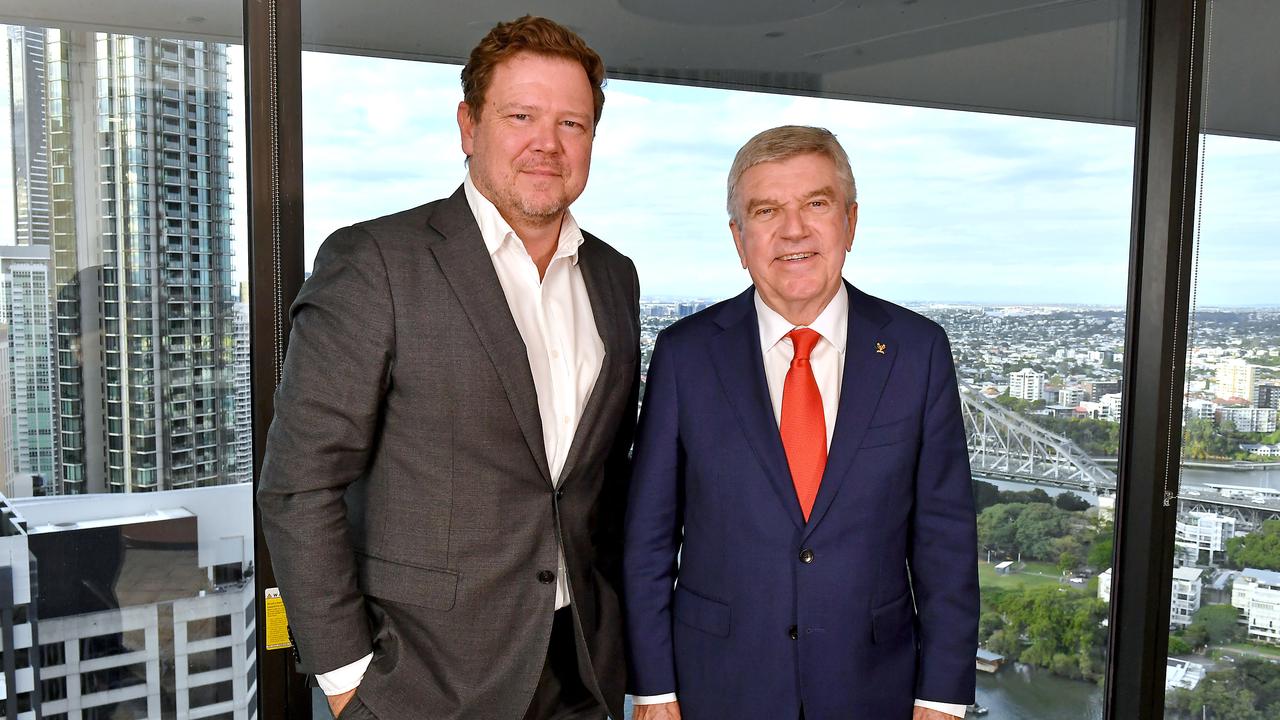 Courier-Mail Editor Chris Jones with Mr Bach. Picture: John Gass