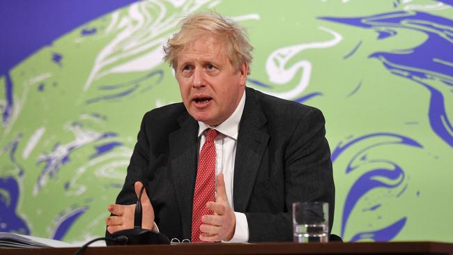 Britain's Prime Minister Boris Johnson speaks during the opening session of the virtual summit from the Downing Street Briefing Room in central London.