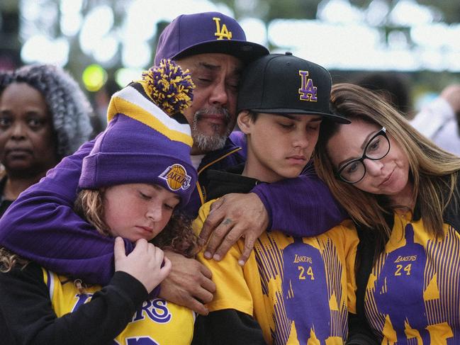 Fans pay respect at a memorial for Kobe Bryant near Staples Center. Picture: AP