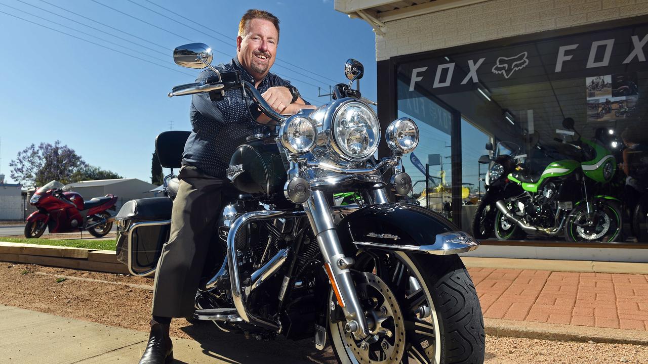 Port Pirie Mayor Leon Stephens on his Harley in front of his store Boats 'n' Bikes in Port Pirie. Picture: Tom Huntley