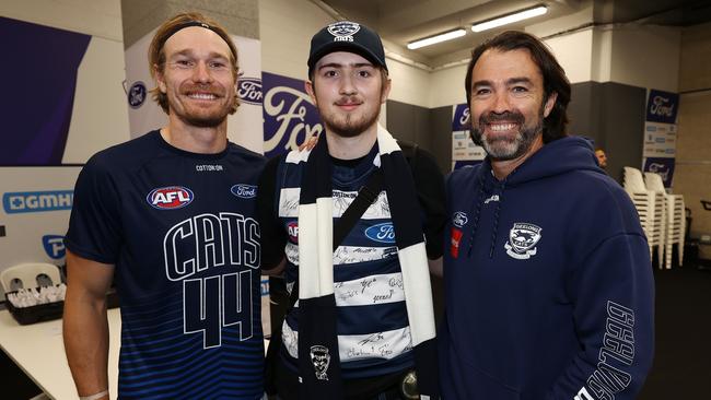 17-year-old Angus Dennis-Hewett Geelong Cats coach Chris Scott and Defender Tom Stewart. Picture: Michael Klein.