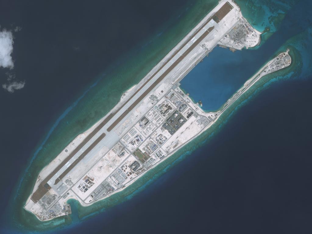 Fiery Cross Reef in the western part of the Spratly Islands group has been turned into an island fortress. Picture: DigitalGlobe via Getty Images.