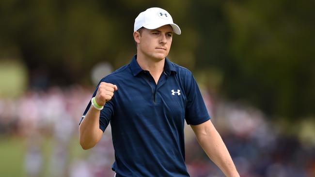 America's Jordan Spieth celebrates making a birdie in a playoff on the18th hole.