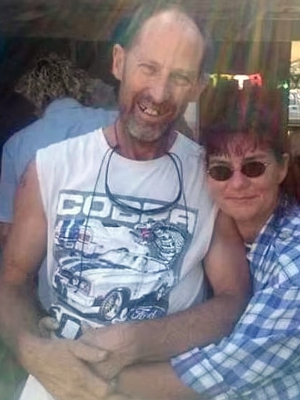 Alan Dare (pictured with his wife) was also shot dead at the property.