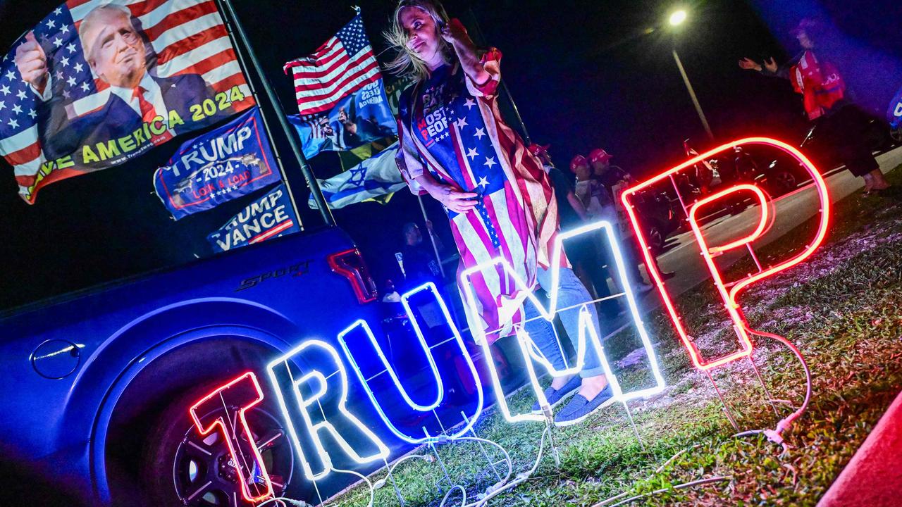 Supporters of Donald Trump gather to show their support near his residence at Mar-a-Lago in West Palm Beach, Florida, on October 28. Picture: Giorgio Viera/AFP