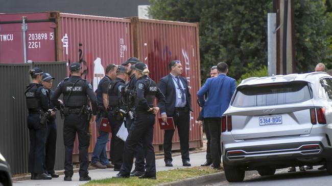 Police and detectives at the scene on Wednesday morning. Picture: RoyVphotography