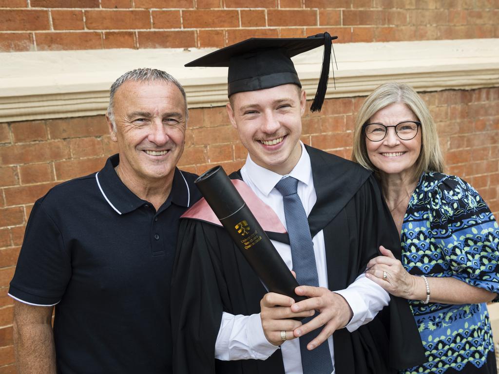 Bachelor of Education (Primary) graduate Liam Davidson with parents Tom and Karen Davidson at a UniSQ graduation ceremony at Empire Theatres, Wednesday, February 14, 2024. Picture: Kevin Farmer