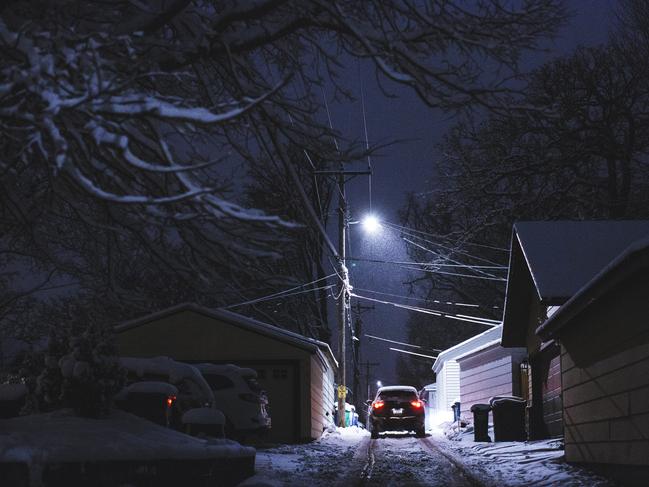 Snow falls in the alley in the Fulton neighbourhood of Minneapolis where Justine Ruszczyk approached a Minneapolis Police Department squad car after reporting a possible sexual assault. Picture: Angus Mordant for News Corp