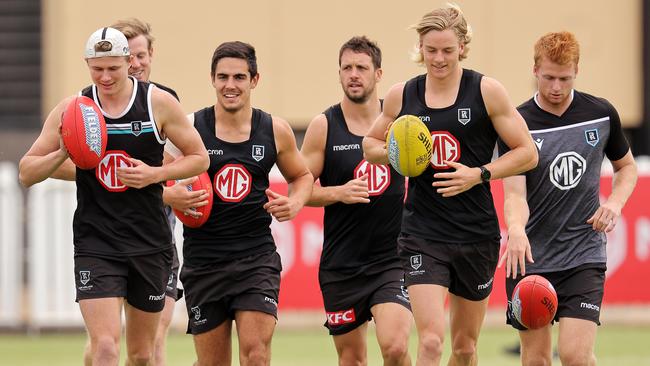 Port Adelaide players (L-R) Xavier Duursma, Joel Garner, Travis Boak, Miles Bergman and Willem Drew. Picture: Getty Images