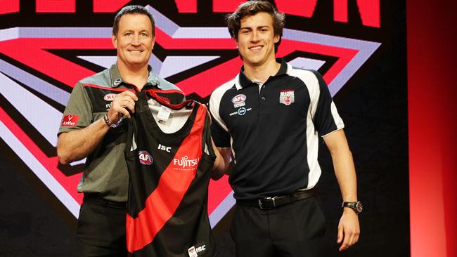 Essendon coach John Worsfold with No.1 pick Andrew McGrath at the AFL Draft. Picture: Toby Zerna