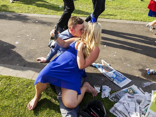 Getting up? Kissing? Taking a selfie? Multi-tasking at its finest. Picture: Jenny Evans/Getty Images