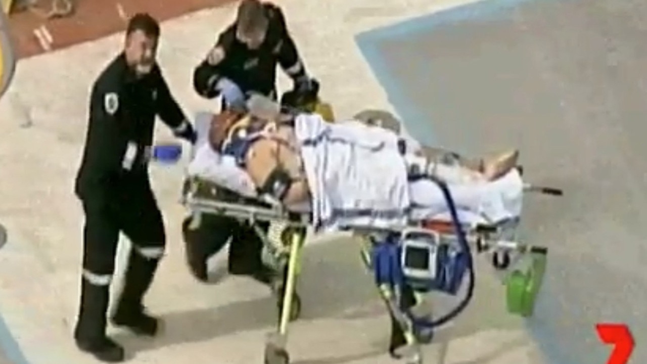 Tony Mokbel being worked on by paramedics at Barwon prison Lara after being stabbed sometime today. Picture: Seven News