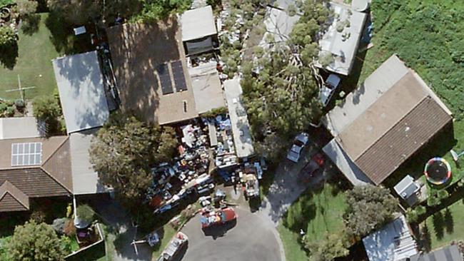 An aerial view of the Berry Street home shows the full extent of clutter in the front yard of the property. Picture: Metro Maps