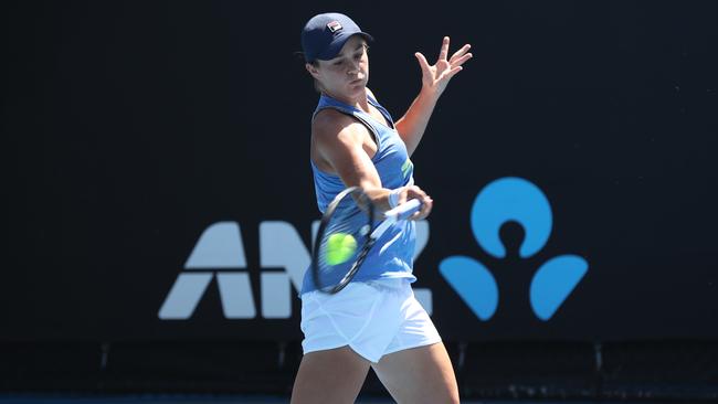 Ashleigh Barty blows out the cobwebs at a practice session today ahead of tomorrow night’s big quarterfinals clash. Picture: David Crosling/AAP