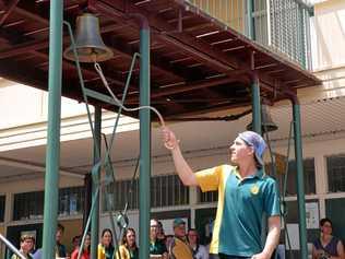 FREEDOM: Burnett State College Year 12 students, class of 2018, ring their school bell to symbolise the end of their schooling. Picture: Felicity Ripper