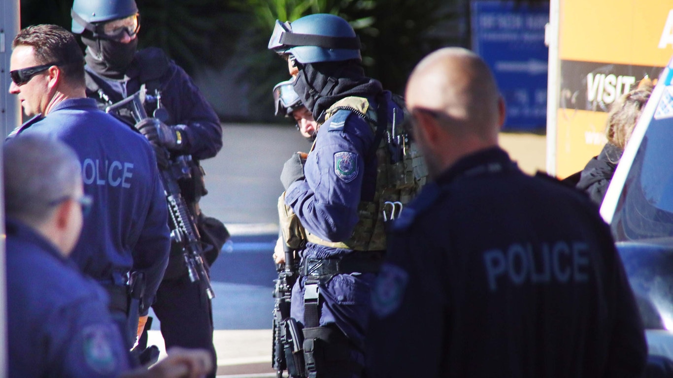 Heavily armed tactical police were involved in this morning's police operation at Sapphire Beach. Picture: Frank Redward