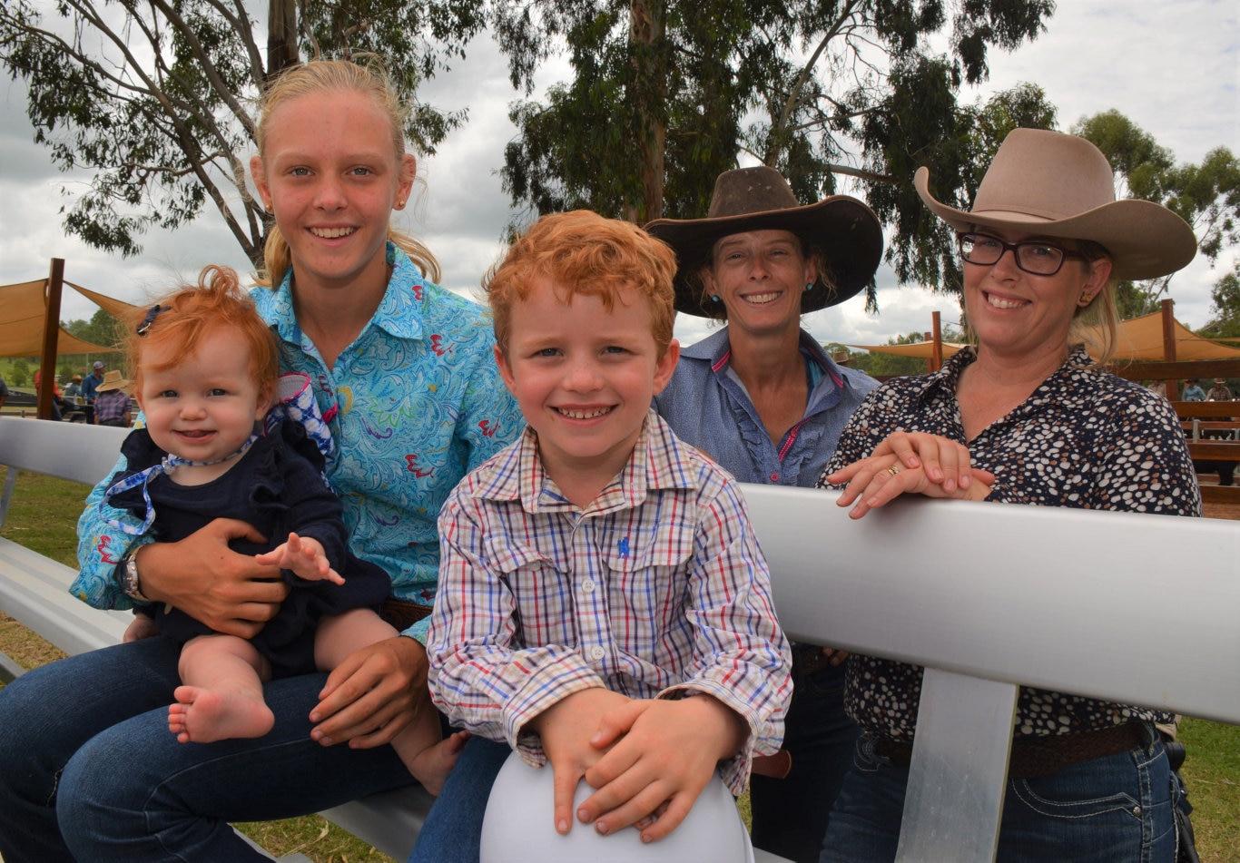 Jessica Wild, little eight-month-old Sophie Postle and her big brother Jack with Sam Wild and Jemma Postle at the 71st annual Cooyar Show on Saturday. Picture: Kate McCormack