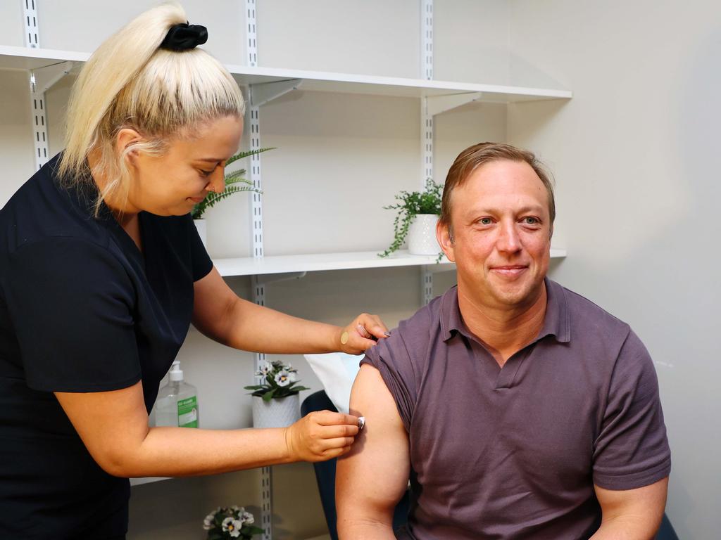 Premier Steven Miles receives a flu vaccination from nurse Elli-Mae Nash on Tuesday. Picture: Tertius Pickard/NCA NewsWire