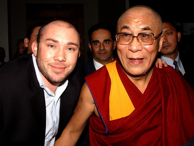 With the Dalai Lama in 2002.