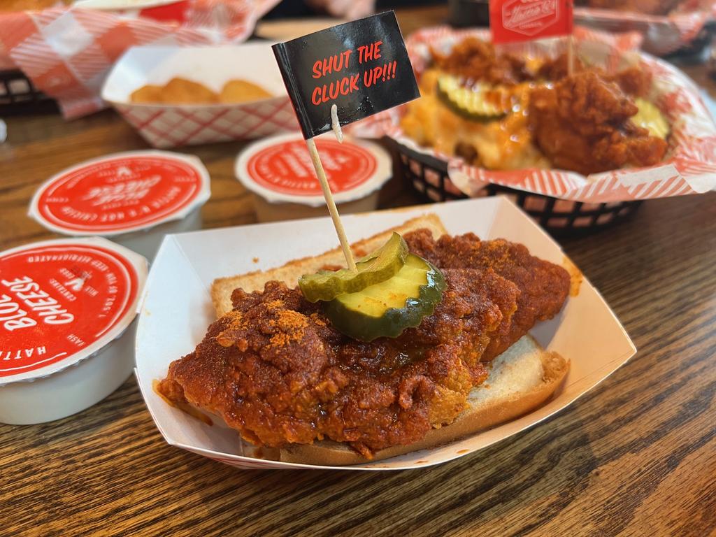 Hattie B’s is a family-owned hot chicken joint that’s exploding across America. Make sure to buy a scoop of vanilla ice cream if you’re going to tackle the ‘Shut the Cluck Up’ spice. Picture: news.com.au