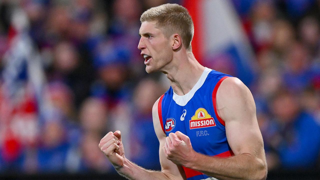 GEELONG, AUSTRALIA – AUGUST 26: Tim English of the Bulldogs celebrates a goal during the round 24 AFL match between Geelong Cats and Western Bulldogs at GMHBA Stadium, on August 26, 2023, in Geelong, Australia. (Photo by Morgan Hancock/Getty Images)