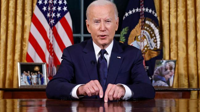 US President Joe Biden addresses the nation on the conflict between Israel and Gaza and the Russian invasion of Ukraine from the Oval Office of the White House in Washington,