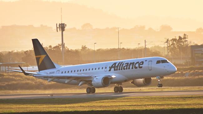 The first Alliance Aviation Embraer 190 lands at Brisbane airport last month. Alliance is probably the only airline in the world that has been profitable throughout this year and raising funds for expansion. Picture: Lyndon Mechielsen