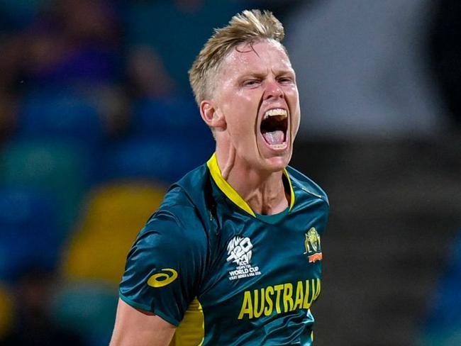 Nathan Ellis of Australia celebrates the dismissal of Kashyap Prajapati of Oman (out of frame) during the ICC men's Twenty20 World Cup 2024 group B cricket match between Australia and Oman at Kensington Oval in Bridgetown, Barbados, on June 5, 2024. (Photo by Randy Brooks / AFP)