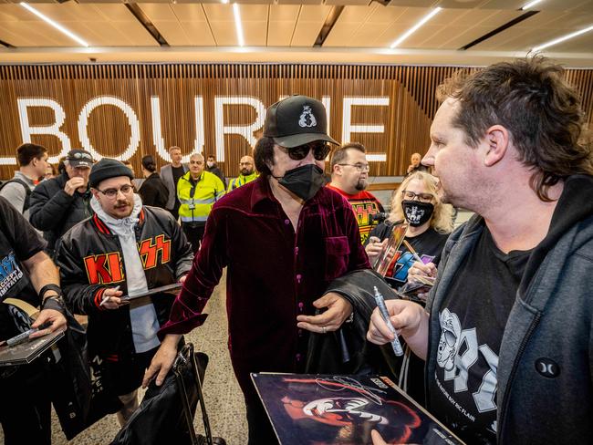 Gene Simmons signs autographs for fans upon arrival at Melbourne Airport to begin the Australian leg of the End of the Road Tour. Picture: Jake Nowakowski